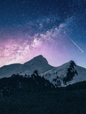 snow mountain under stars