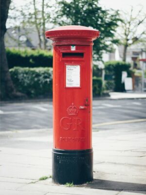 red and black GR post office letter container